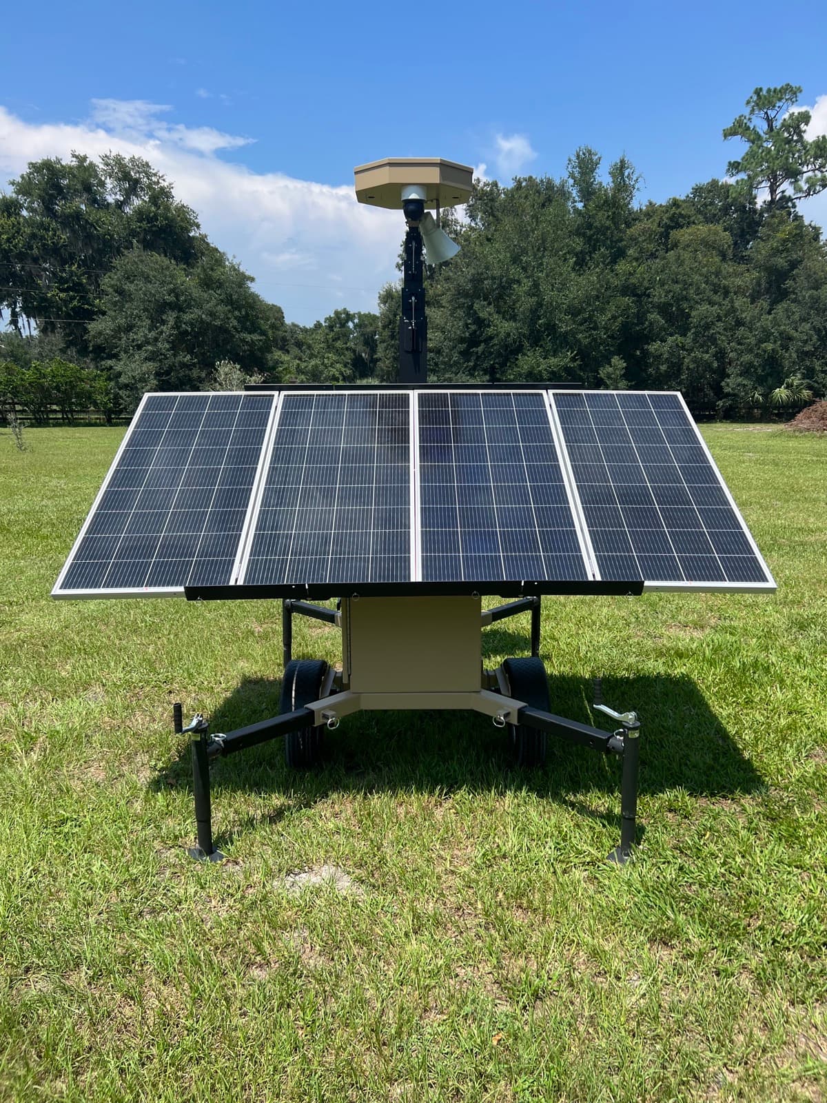 SolarCam360 solar surveillance unit deployed on open pasture