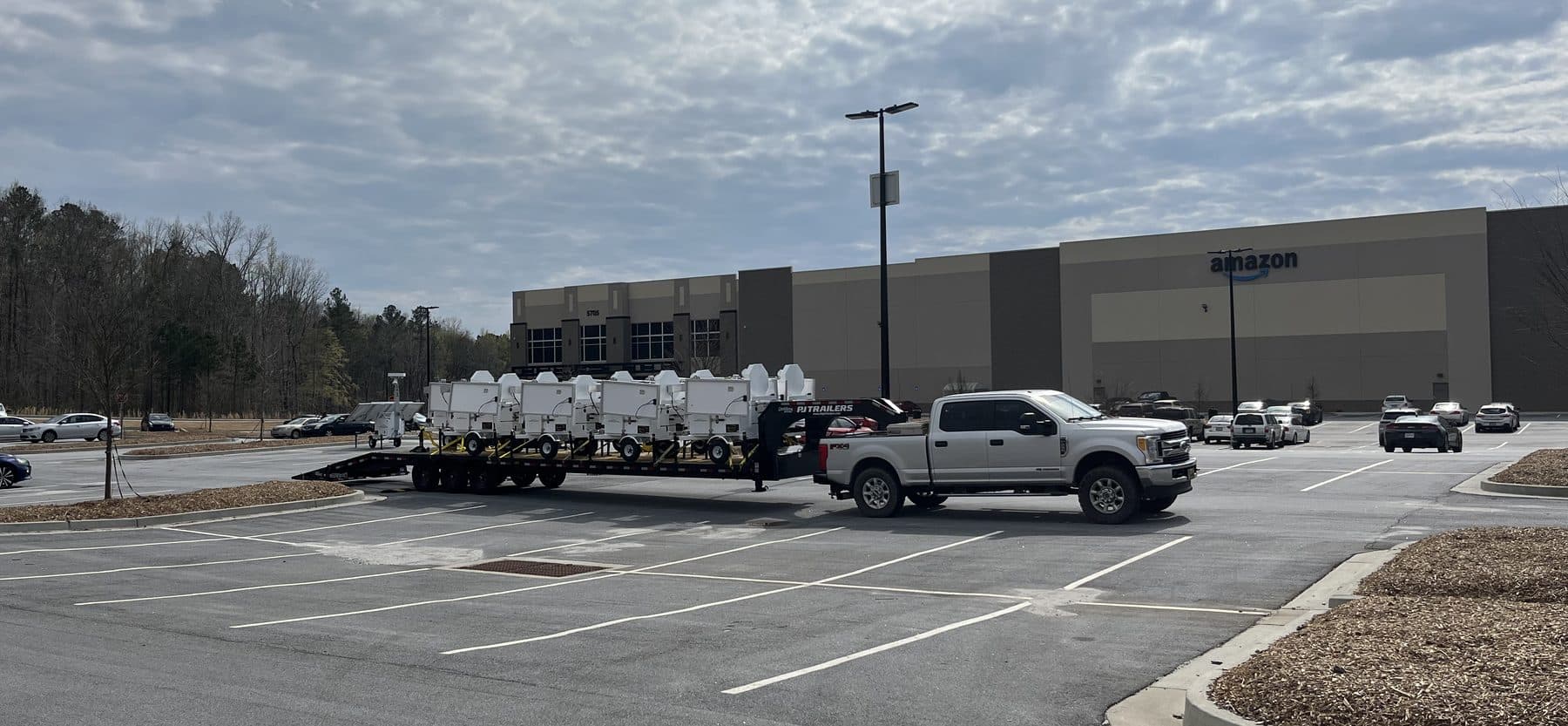 SolarCam360 surveillance trailer at a commercial facility loading area