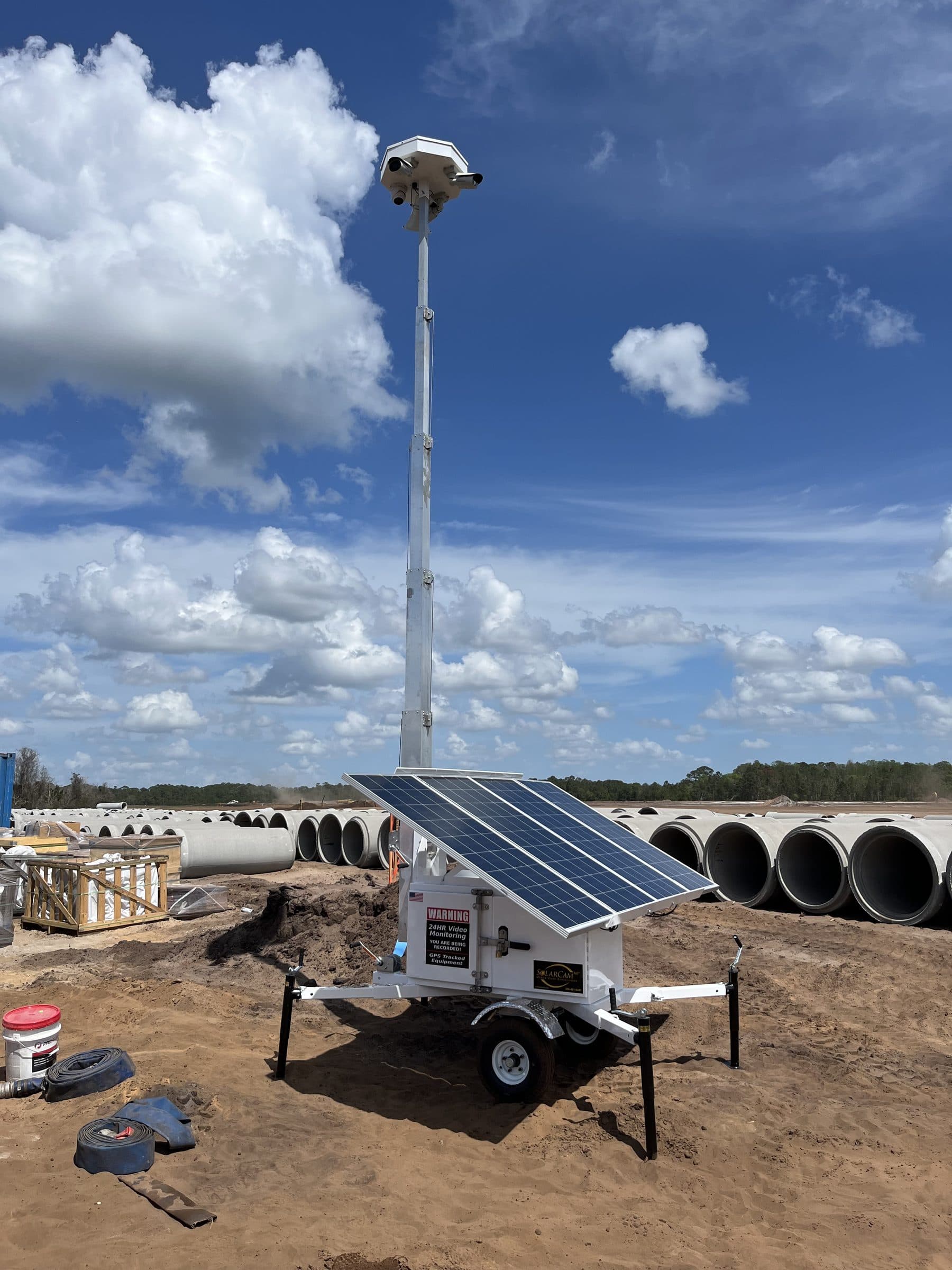 SolarCam360 solar surveillance trailer deployed on an active construction site